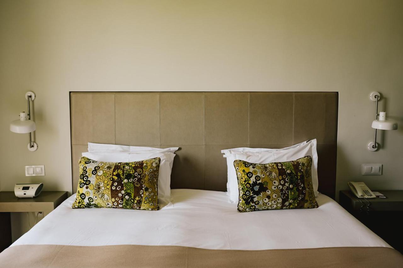 M'Ar De Ar Aqueduto Otel Évora Dış mekan fotoğraf A bed with a headboard